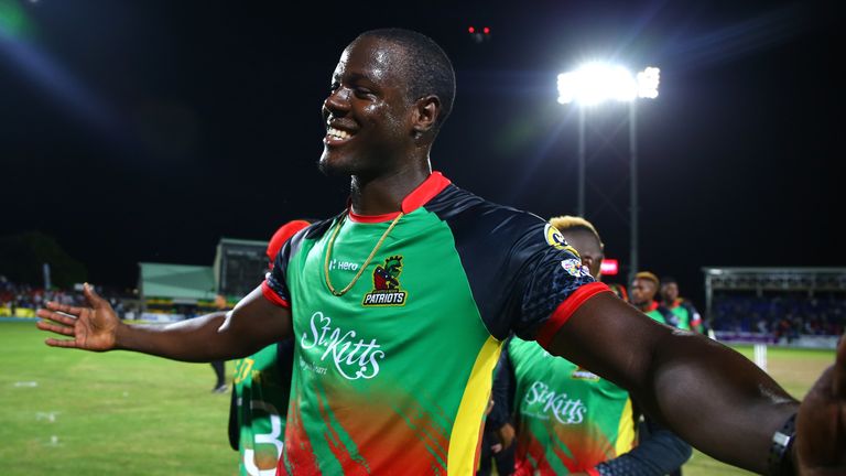 St Kitts and Nevis Patriots captain Carlos Brathwaite celebrates his side&#39;s CPL victory
