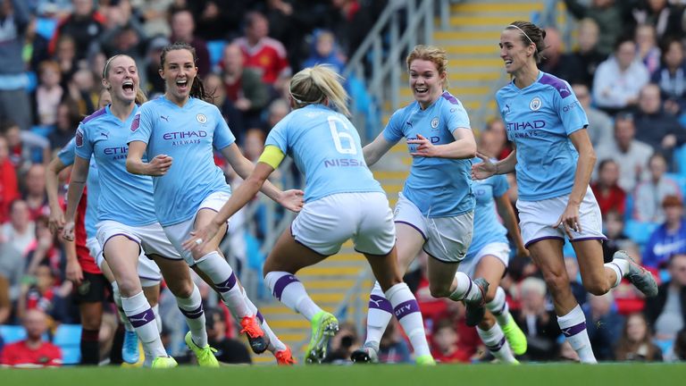 Caroline Weir celebrates firing Manchester City Women into the lead against Manchester United Women