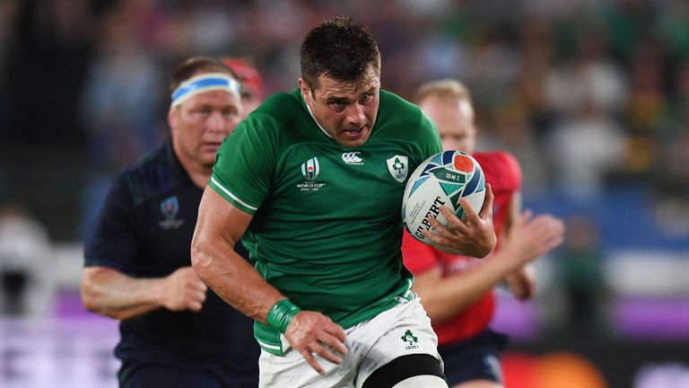 Ireland's number 8 CJ Stander (C) runs with the ball during the Japan 2019 Rugby World Cup Pool A match between Ireland and Scotland at the International Stadium Yokohama in Yokohama on September 22, 2019. (Photo by CHARLY TRIBALLEAU / AFP) (Photo credit should read CHARLY TRIBALLEAU/AFP/Getty Images)