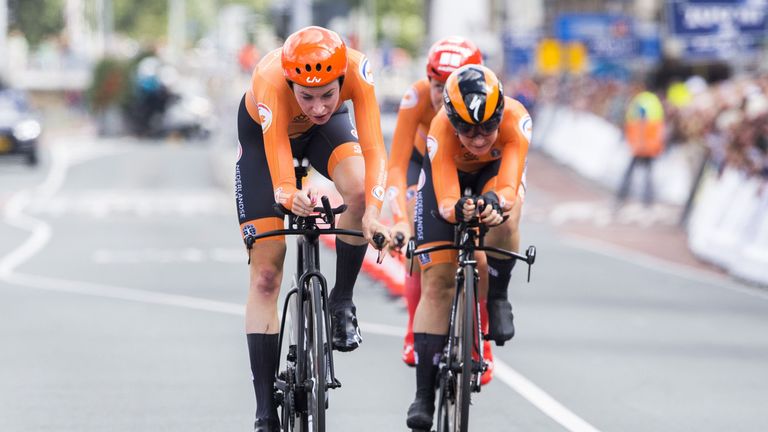 Riejanne Markus, Amy Pieters, and Floortje Mackaij of the Netherlands cross the finish line of the Mixed Team Relay during the European Road Cycling Championships in Alkmaar