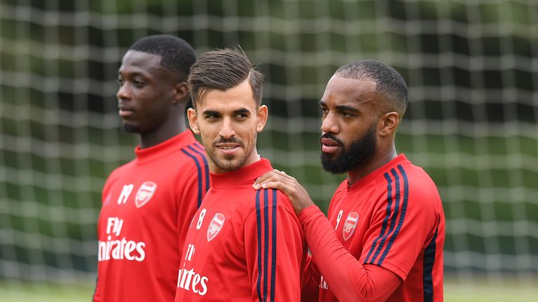 ST ALBANS, ENGLAND - AUGUST 10: (L-R) Dani Ceballos and Alex Lacazette of Arsenal during the Arsenal Training Session at London Colney on August 10, 2019 in St Albans, England. (Photo by Stuart MacFarlane/Arsenal FC via Getty Images)