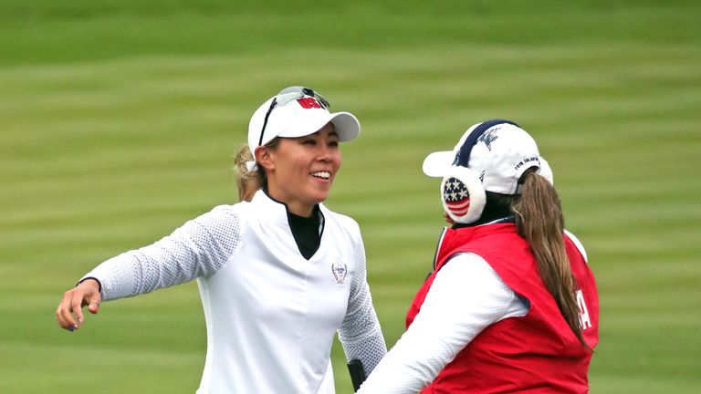 Danielle Kang and Lizette Salas celebrate their fourballs victory on the second day of the Solheim Cup