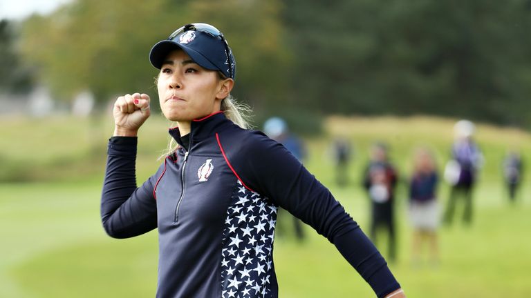 AUCHTERARDER, SCOTLAND - SEPTEMBER 15: Danielle Kang of Team USA celebrates her putt on the thirteenth green in her match against Carlota Ciganda of Team Europe during the final day singles matches of the Solheim Cup at Gleneagles on September 15, 2019 in Auchterarder, Scotland. (Photo by Jamie Squire/Getty Images)