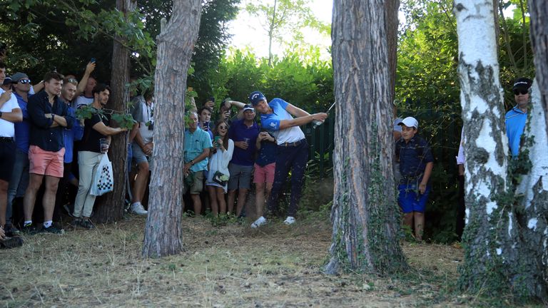 Danny Willett pulled off an incredible escape from the trees on day three
