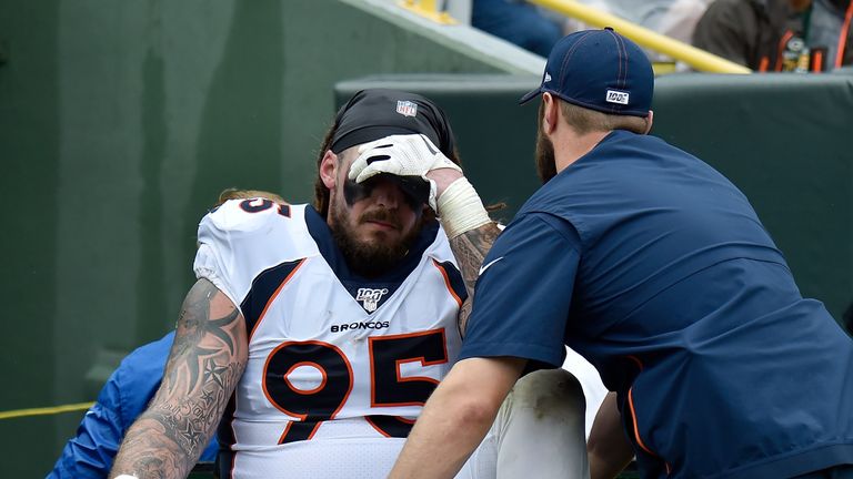 Derek Wolfe went off injured against Green Bay on Sunday