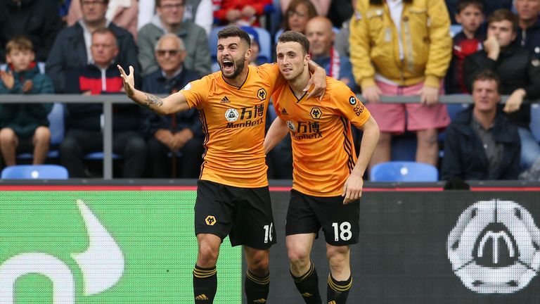 Diogo Jota celebrates his last-gasp equaliser with Patrick Cutrone