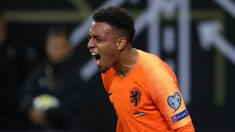 Donyell Malen celebrates after putting the Netherlands 3-2 up away to Germany