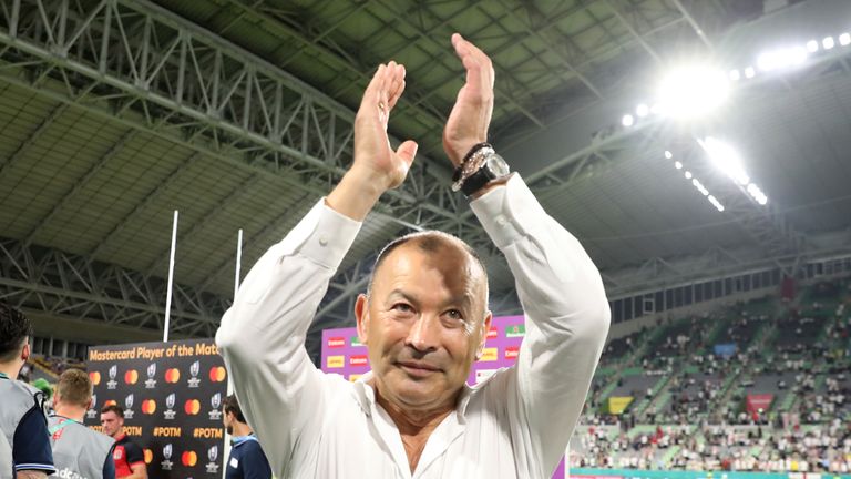 Eddie Jones applauds the crowd after England's win against the USA