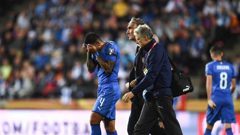 Italy's Emerson limps off after picking up an injury during the Euro 2020 qualifier between Italy and Finland 