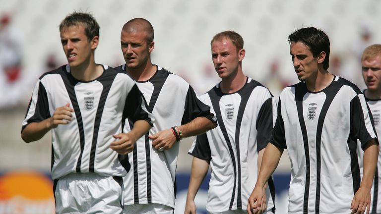LISBON, PORTUGAL - JUNE 9:  Phil Neville,David Beckham,Nicky Butt and Gary Neville of England warm up during the teams training session at the National Stadium, their Euro 2004 training camp June 9, 2004 near Lisbon, Portugal. (Photo by Ross Kinnaird/Getty Images).. *** Local Caption *** Phil Neville;David Beckham;Nicky Butt;Gary Neville
