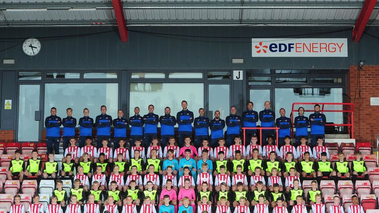 Photo of players and staff in Exeter City's academy