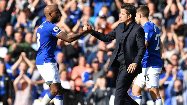 Delph celebrates at full-time with his manager Marco Silva 
