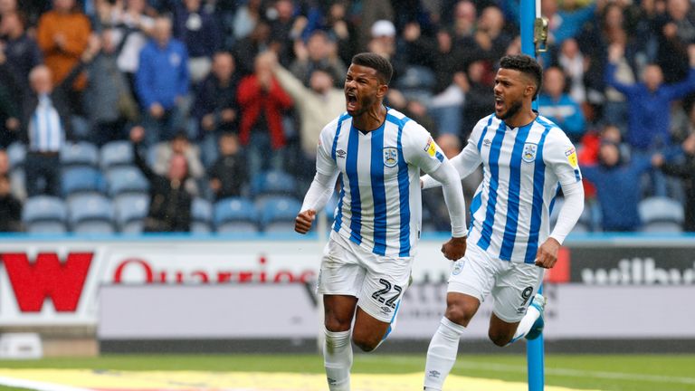Fraizer Campbell and Elias Kachunga celebrate Huddersfield Town's opening goal