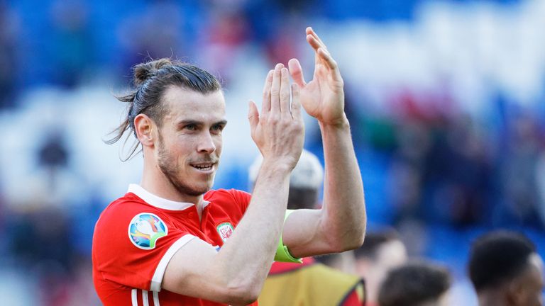 Gareth Bale captianing Wales.