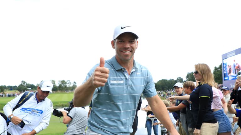 Paul Casey is all smiles as he walks off the 18th hole at the Porsche European Open in Hamburg
