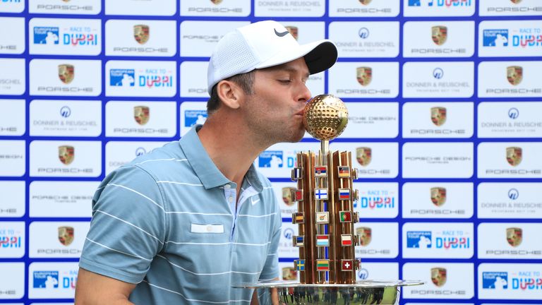 Paul Casey celebrates with the trophy after his Porsche European Open victory