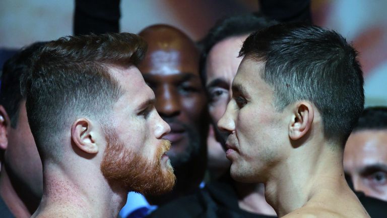 Boxer Canelo Alvarez (L) and WBC, WBA and IBF middleweight champion Gennady Golovkin pose during their official weigh-in at MGM Grand Garden Arena on September 15, 2017 in Las Vegas, Nevada. Golovkin will defend his titles against Alvarez at T-Mobile Arena on September 16 in Las Vegas.