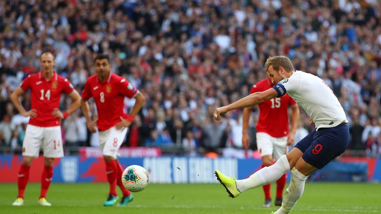 Harry Kane scores from the penalty spot to complete his hat-trick against Bulgaria