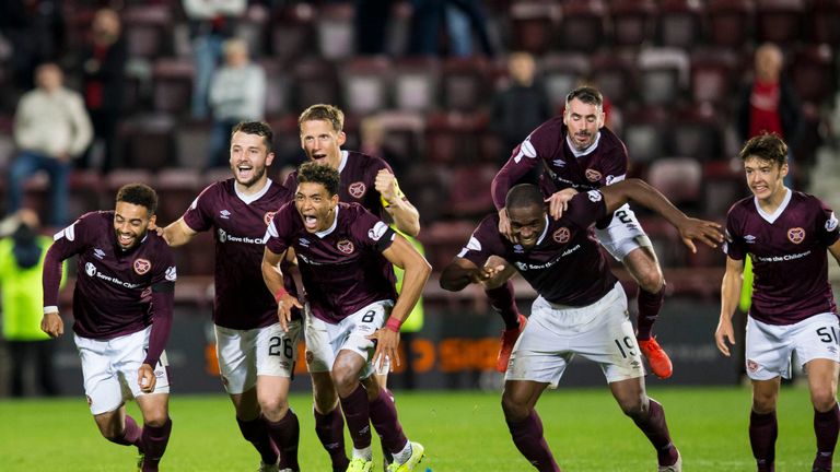 Hearts players celebrate after winning the penalty shootout 