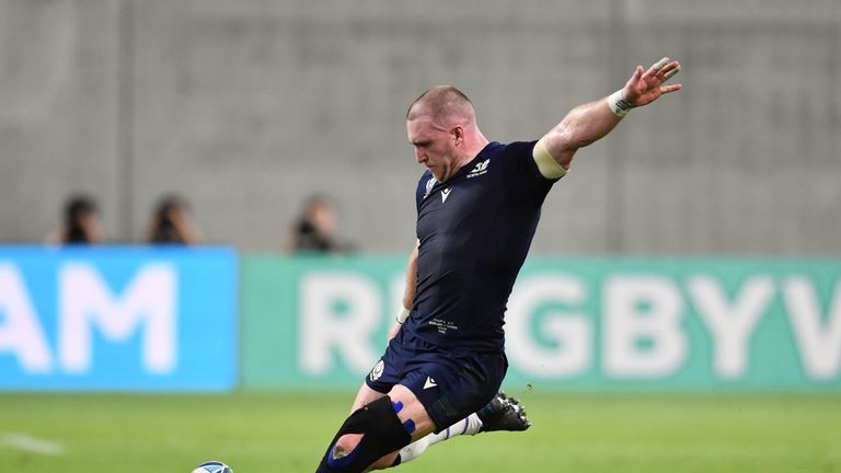 KOBE, JAPAN - SEPTEMBER 30: Scotland's Stuart Hogg drops a goal during the Rugby World Cup 2019 Group A game between Scotland and Samoa at Kobe Misaki Stadium on September 30, 2019 in Kobe, Hyogo, Japan. (Photo by Ashley Western/MB Media/Getty Images)