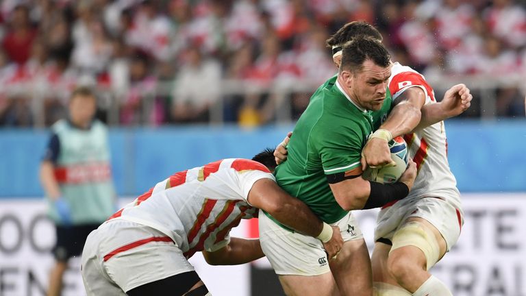 Ireland's Cian Healy is tackled by Japan's Luke Thompson during their World Cup encounter