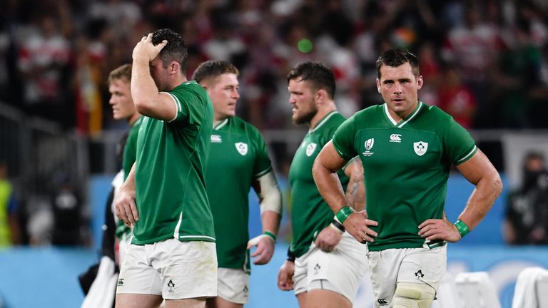 Ireland's players dejected after their defeat in Shizuoka