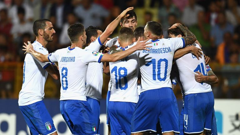 Andrea Belotti of Italy celebrates with team-mates after scoring 
