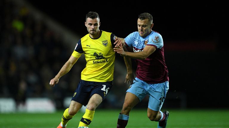 West Ham's Jack Wilshere battles for the ball with Oxford United's Anthony Forde