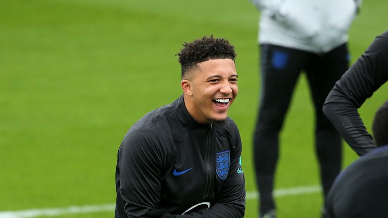 Jadon Sancho smiles during an England team training session ahead of the Euro 2020 qualifier against Kosovo