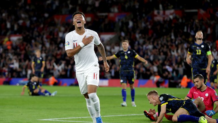 Jadon Sancho celebrates his first international goal for England