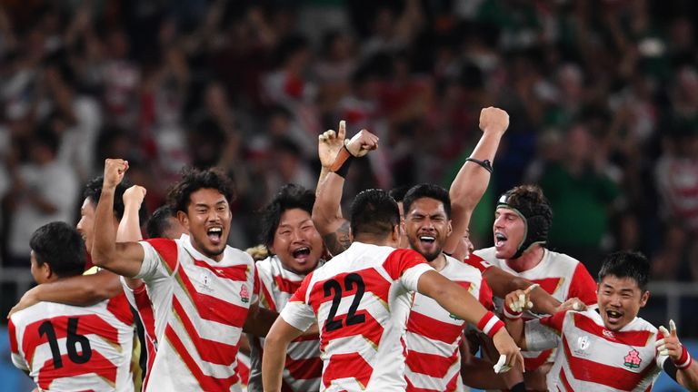 FUKUROI, JAPAN - SEPTEMBER 28: Japan players celebrate after their 19-12 victory in the Rugby World Cup 2019 Group A game between Japan and Ireland at Shizuoka Stadium Ecopa on September 28, 2019 in Fukuroi, Shizuoka, Japan. (Photo by Ashley Western/MB Media/Getty Images)