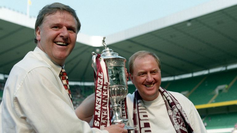 Jim Jefferies (left) and assistant Billy Brown celebrate with the Scottish Cup in 1998