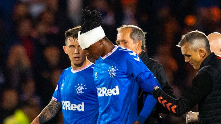 Joe Aribo suffers a head injury in the first half of their Scottish League Cup win at Livingston