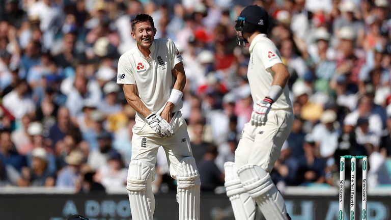 Joe Denly laughs after being hit in the groin