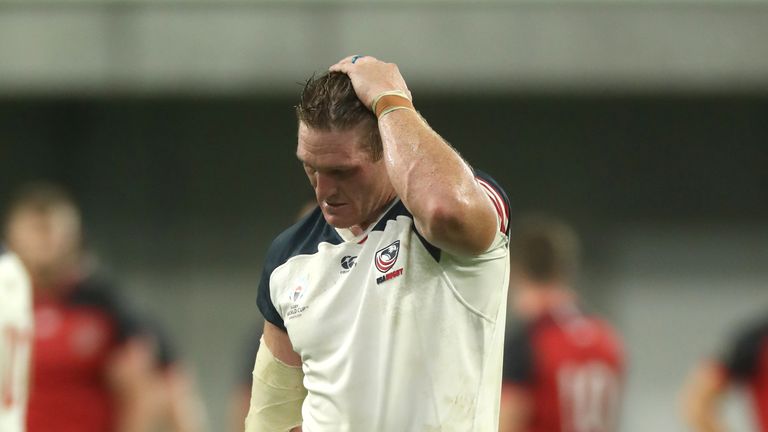 John Quill of USA walks off the pitch after being sent off for a tackle on Owen Farrell 