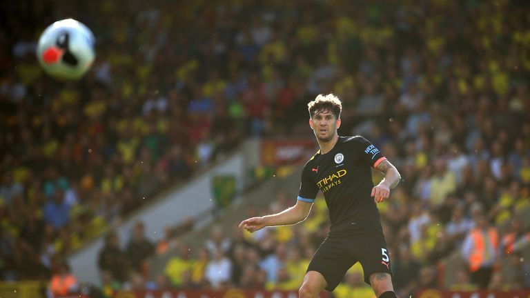 John Stones in action during the Premier League match between Norwich City and Manchester City at Carrow Road on September 14, 2019 