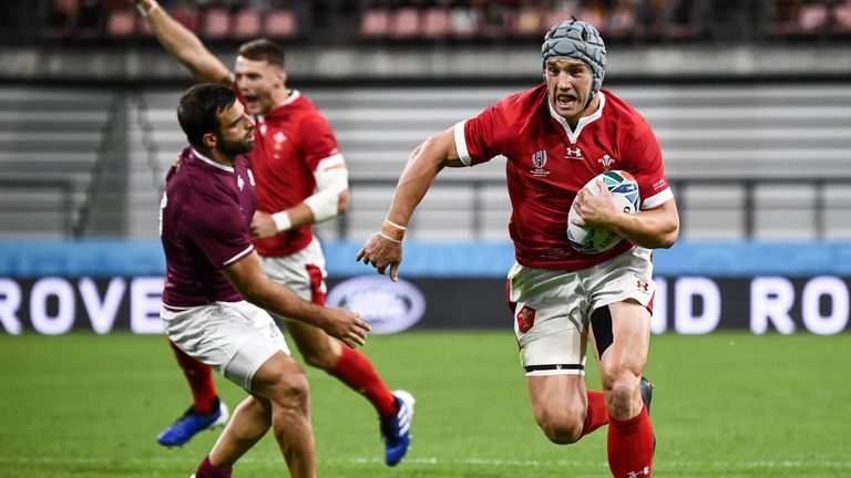Wales' centre Jonathan Davies scores a try during the Japan 2019 Rugby World Cup Pool D match between Wales and Georgia at the City of Toyota Stadium in Toyota City on September 23, 2019. (Photo by Anne-Christine POUJOULAT / AFP) (Photo credit should read ANNE-CHRISTINE POUJOULAT/AFP/Getty Images)