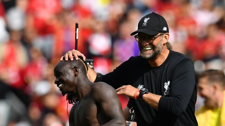 Jurgen Klopp with Sadio Mane at full-time in Liverpool's 3-1 home win over Newcastle