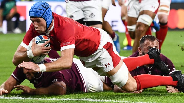 Wales' flanker Justin Tipuric scores a try during the Japan 2019 Rugby World Cup Pool D match between Wales and Georgia at the City of Toyota Stadium in Toyota City on September 23, 2019. (Photo by Anne-Christine POUJOULAT / AFP) (Photo credit should read ANNE-CHRISTINE POUJOULAT/AFP/Getty Images)
