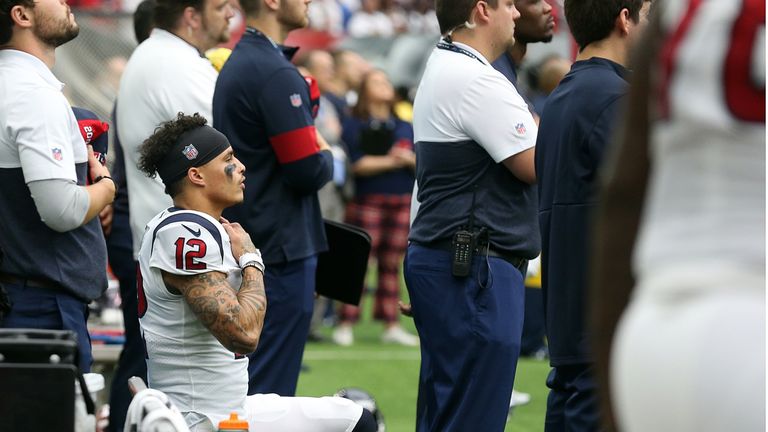 Texans receiver Kenny Still continues to kneel during the national anthem