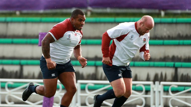 England props, Kyle Sinckler (L) and Dan Cole sprint during the England training session on September 19, 2019 in Sapporo, Japan. 