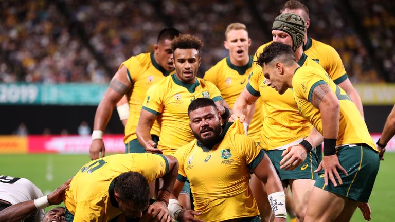 Tolu Latu touched down for two maul tries as the Wallabies hit the front for the first time on 62 minutes