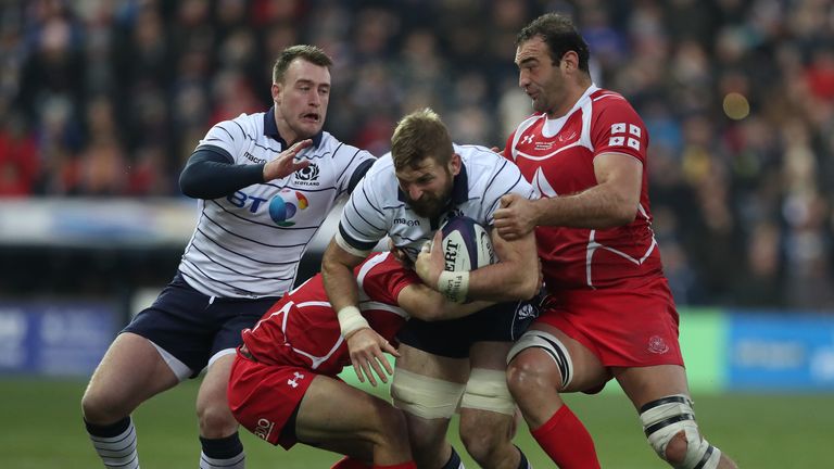 KILMARNOCK, SCOTLAND - NOVEMBER 26:  John Barclay of Scotland is tackled by Mamuka Gorgodze of Georgia during the Autumn Test Match between Scotland and Georgia at  Rugby Park on November 26, 2016 in Kilmarnock, Scotland. (Photo by Ian MacNicol/Getty Images)