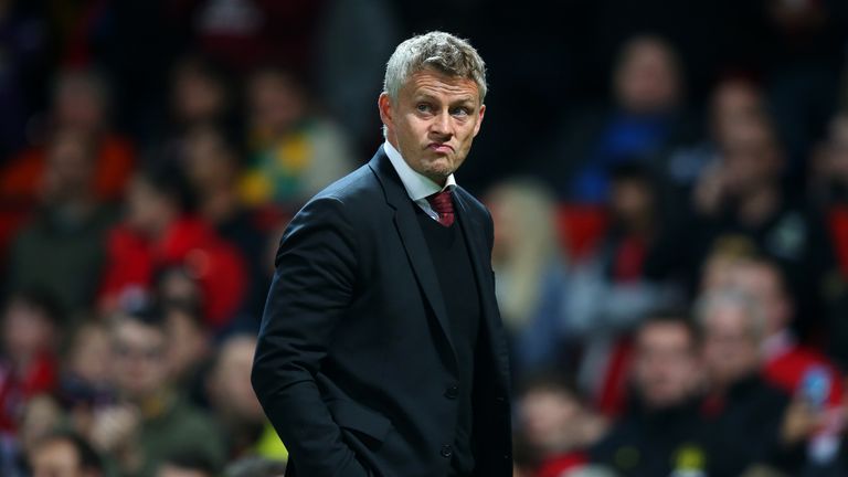 Manchester United Manager, Ole Gunnar Solskjaer walks off at half time during the Carabao Cup Third Round match between Manchester United and Rochdale AFC at Old Trafford 