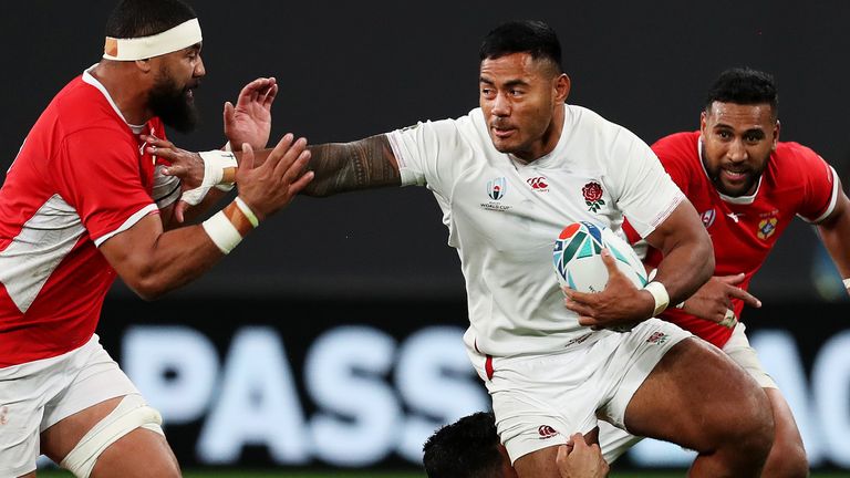 Manu Tuilagi ran in two tries to help England open their World Cup campaign with a win