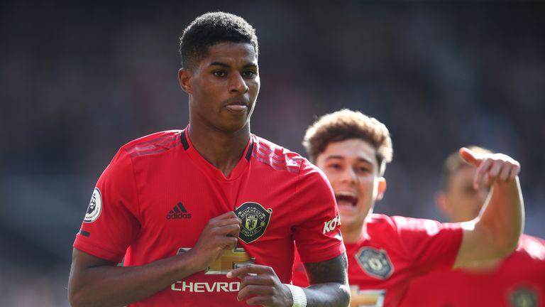 Marcus Rashford celebrates after making it 1-0 from the penalty spot
