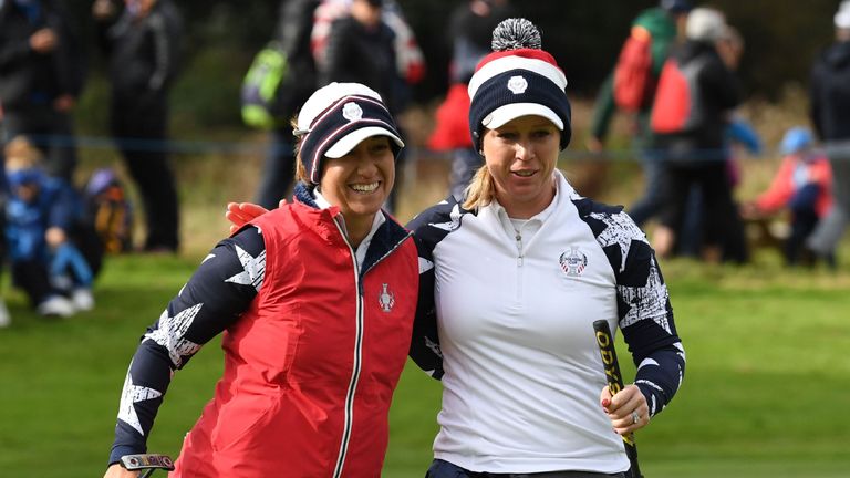 USA's Marina Alex (L) and USA's Morgan Pressel celebrate on the 12th green on the second day of the Solheim Cup