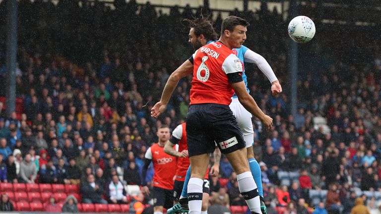 Blackburn Rovers' Bradley Dack and Luton Town's Matty Pearson during the Sky Bet Championship match at Ewood Park 