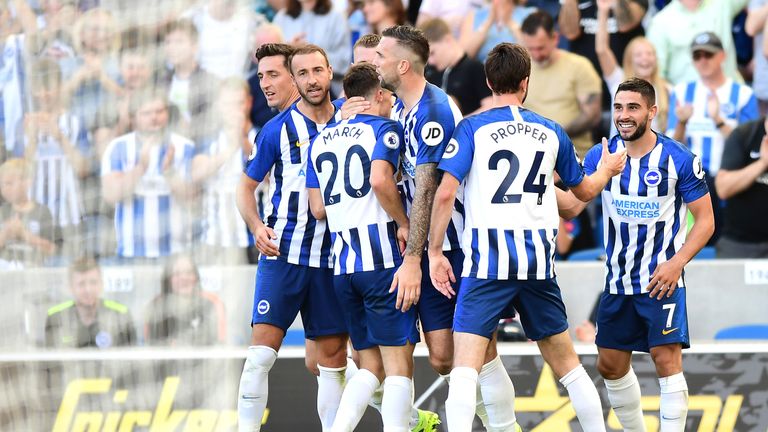 The Brighton players celebrate Neal Maupay's 51st-minute opener