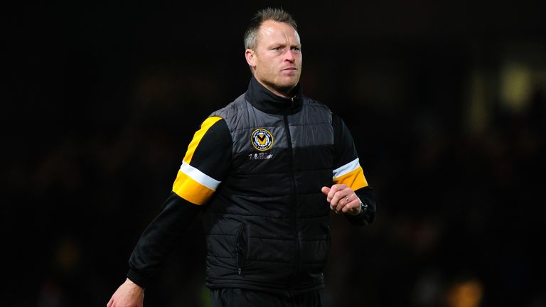 NEWPORT, WALES - MAY 09: Michael Flynn Manager of Newport County applauds the fans at the final whistle during the Sky Bet League Two Play-off Semi Final: First Leg match between Newport County and Mansfield Town at Rodney Parade on May 09, 2019 in Newport, Wales. (Photo by Athena Pictures/Getty Images)